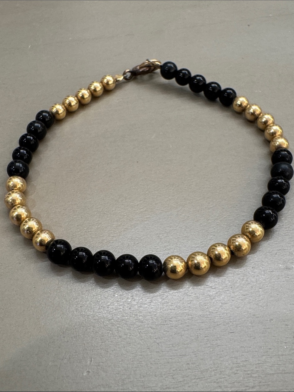 Women's Black and Gold Beaded Necklace — Polished Two-Tone Strand